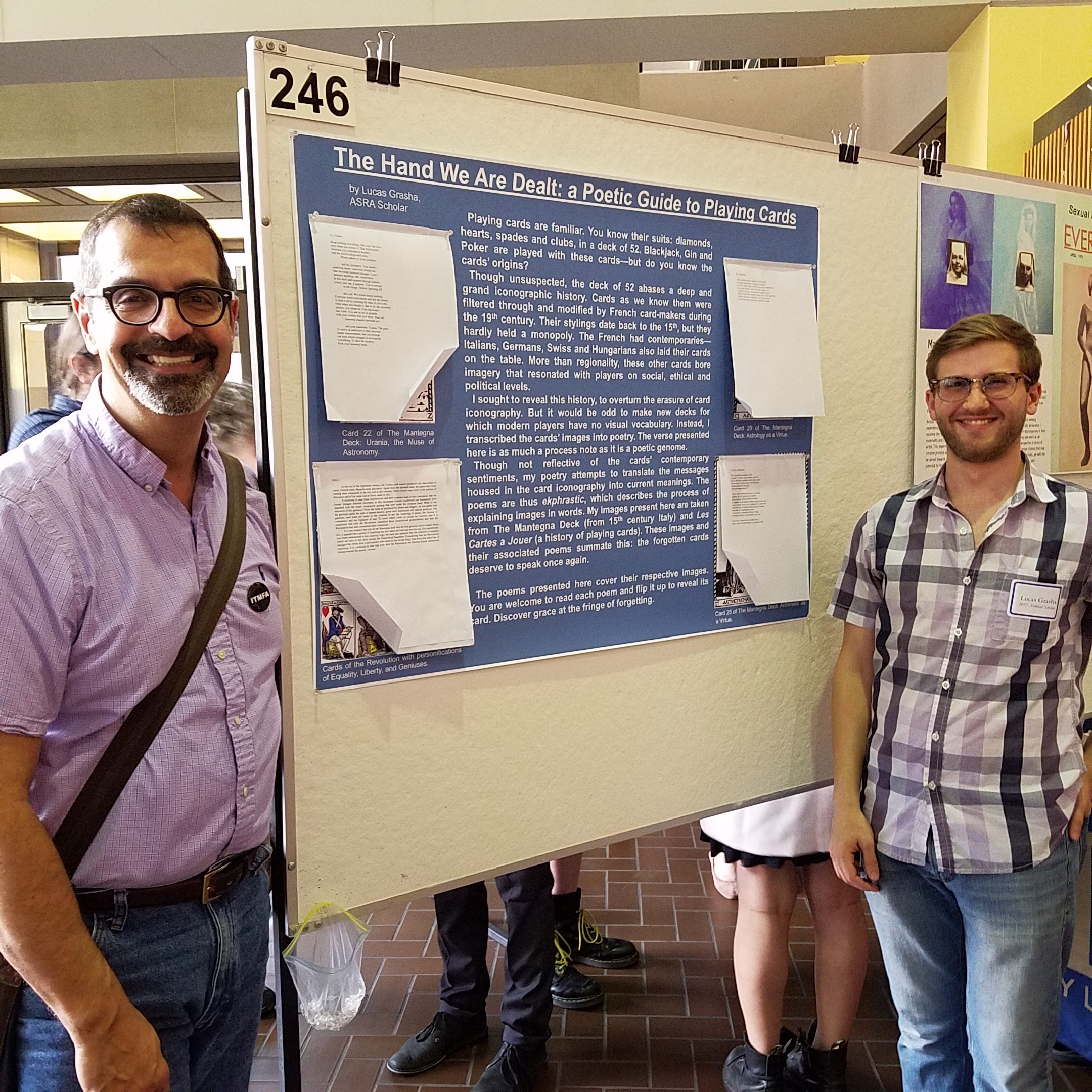 Jim Cassaro with Lucas Grasha next to Lucas' poster