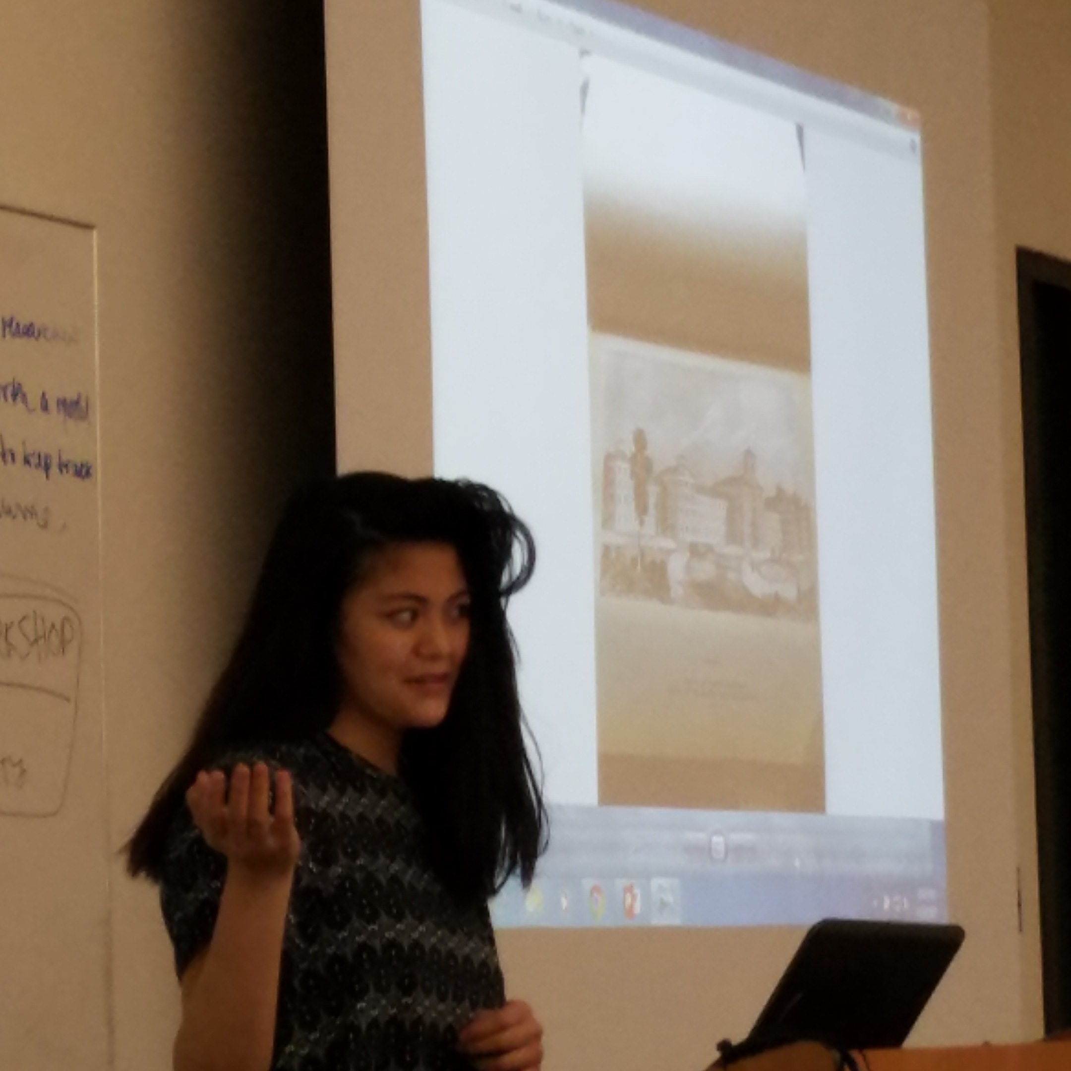 Alina presenting research during a workshop