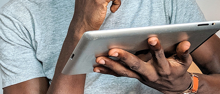 A person using an iPad